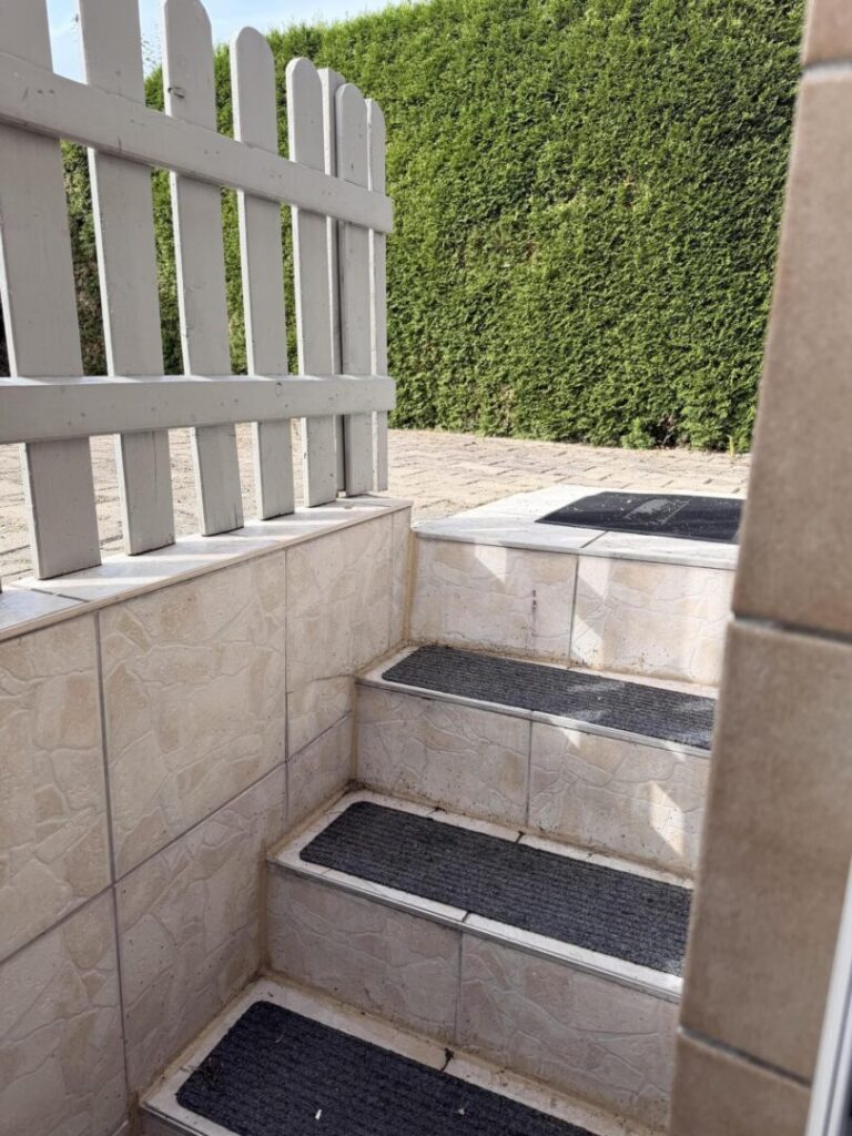 Treppe zum Hinterhof